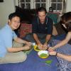 Do Yeong, Miguel and Dawn peeling beans